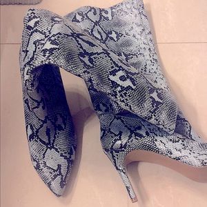 Blue snake high heel boots